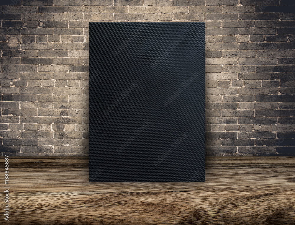Aufkleber blank black fabric canvas frame at grunge brick wall and wood floor,mock up template for adding your