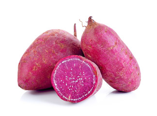 Purple Colored Sweet Potatoes on White background