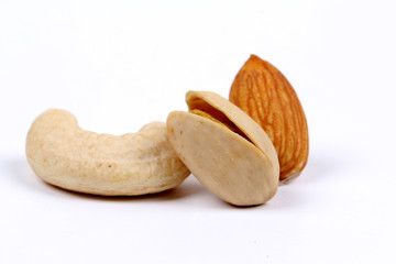 Assorted nuts, dry fruits, mix nuts, almond, walnut, pistachio, cashew, raisin, berry