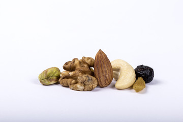 Assorted nuts, dry fruits, mix nuts, almond, walnut, pistachio, cashew, raisin, berry