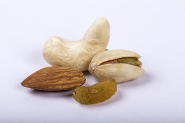 Assorted nuts, dry fruits, mix nuts, almond, walnut, pistachio, cashew, raisin, berry