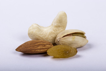 Assorted nuts, dry fruits, mix nuts, almond, walnut, pistachio, cashew, raisin, berry