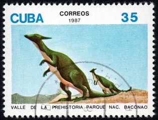 UKRAINE - CIRCA 2017: A stamp printed in Cuba, shows a extinct animals from the park of dinosaurs in the reserve Baconao, the series Valle de la prehistoria parque nac. Baconao, circa 1987