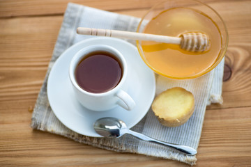 Herbal tea in a cup with  and honey