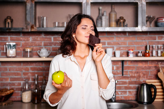 Woman On The Diet Craving To Eat Chocolate.