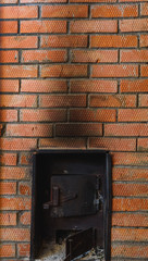iron stove in the Russian bath lined with red brick