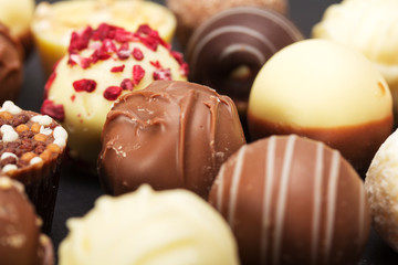 Obraz na płótnie Canvas Close up of a selection of delicious chocolates