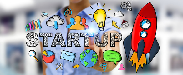 Businesswoman touching hand drawn startup text and red rocket