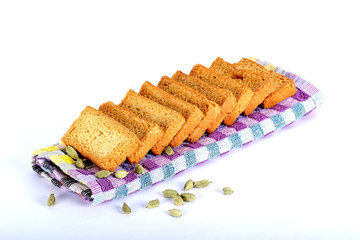 rusk with cardamom flavor, rusk on jute, rusk on cloth, rusk