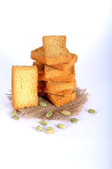 rusk with cardamom flavor, rusk on jute, rusk on cloth, rusk