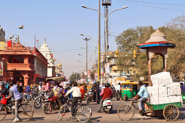 Crowded and traffic packed world famous market Chandni Chowk situated in front of Historical Red Fort. - Powered by Adobe