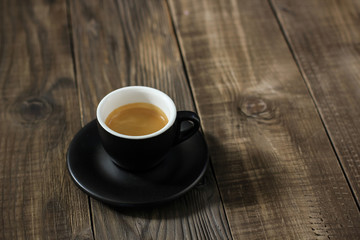 Hot coffee espresso on wood table
