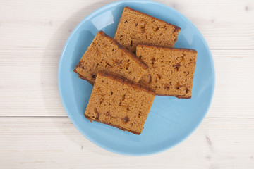 Traditional Dutch cake Ontbijtkoek on wooden background