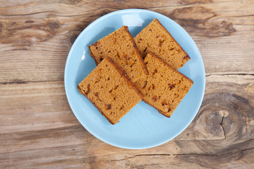 Traditional Dutch cake Ontbijtkoek on wooden background