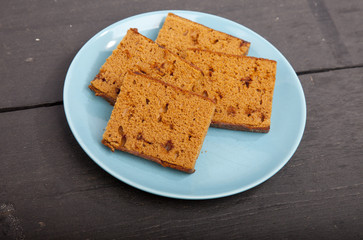 Traditional Dutch cake Ontbijtkoek on wooden background
