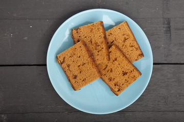 Traditional Dutch cake Ontbijtkoek on wooden background
