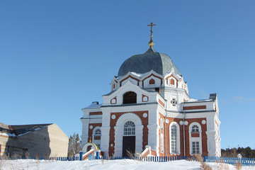 Fototapeta na wymiar Architectural detail Church of the Intercession of the Most Holy Mother of God in Zavyalovo, Novosibirsk region, Russia, founded in 1897