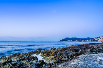 sunrise by the sea shore