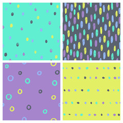 Set of bright paint drops seamless patterns. Vector hand drawn background