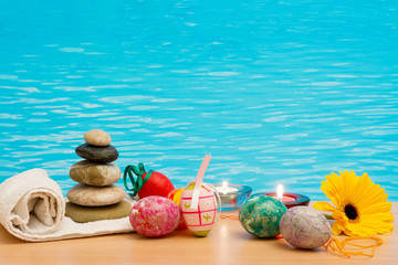 Easter in pool, wellness and relax. Eggs and water background for party and spa