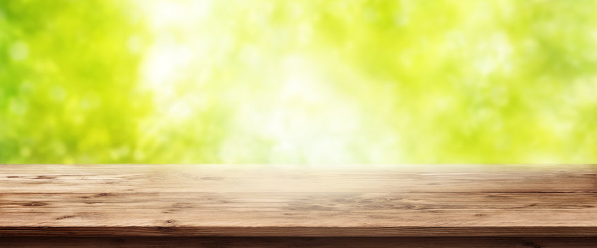 Spring background with wooden table