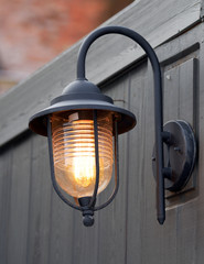 Electric lamp on the wall.