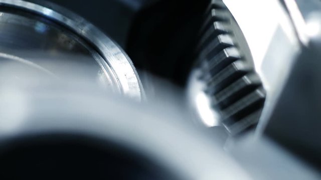 Rotating of metal parts in a mechanical device. Spinning mechanism of car engine