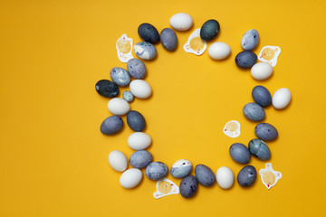 frame of eggs and painted chickens