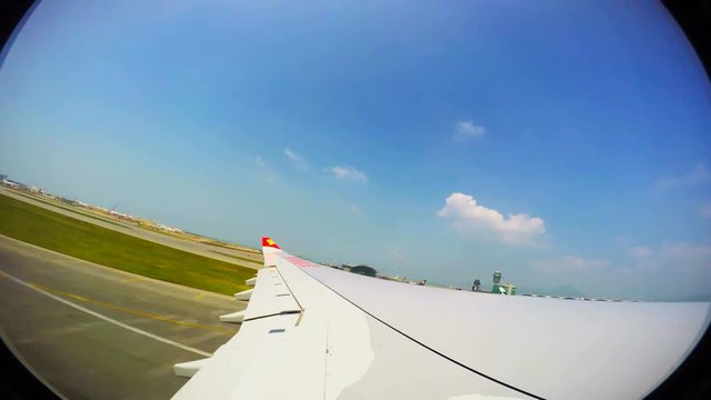 Aircraft take off in the Asian tropical country. Tourists go on vacation to a resort