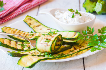 Grilled zucchini served with cheese