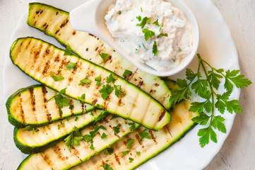 Grilled zucchini served with cheese