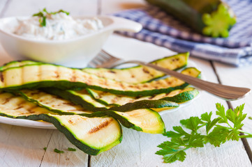 Grilled zucchini served with cheese