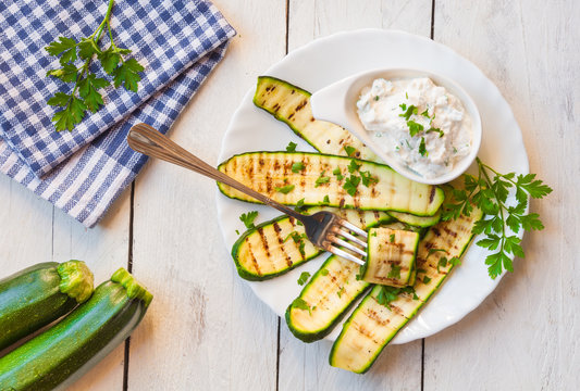 Grilled zucchini served with cheese