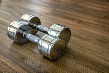 A Pair of Dumbells in a Sport Fitness Room