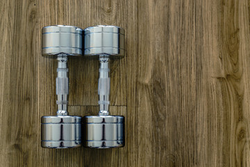 A Pair of Dumbells in a Sport Fitness Room