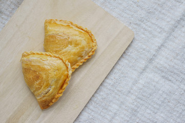Dumplings baked custard filling on wooden Plate