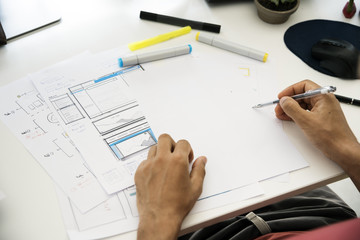 Man Working Planning Documents White Table
