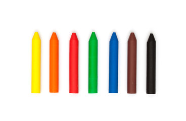Wax Crayons in a row with primary Colors - isolated on White Background