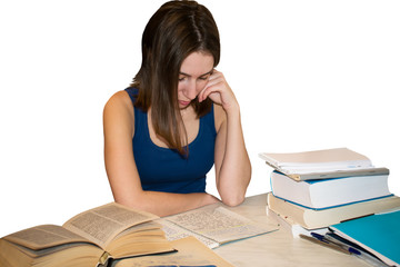 Young girl student sitting at table and studying literature 