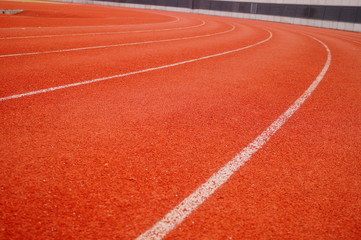 Red plastic track and field track