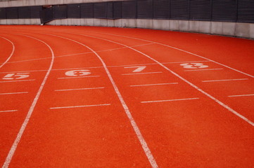 Red plastic track and field track