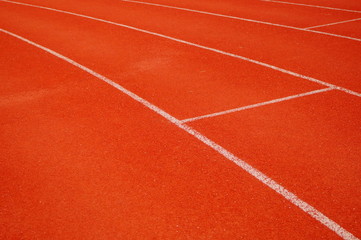 Red plastic track and field track