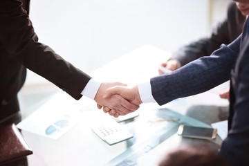 Business partnership meeting concept. Image businessmans handshake. Successful businessmen handshaking after good deal. Horizont