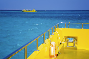 View from boat deck on the sea waves