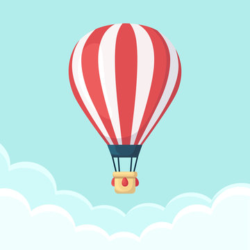 Hot air balloon in the sky with clouds. Flat cartoon design. Vector illustration