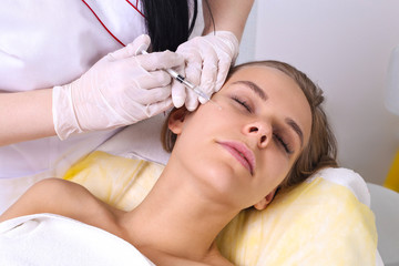 Obraz na płótnie Canvas Mesotherapy injections in the face.