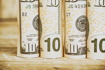  dollar bills tied with rubber band