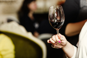 beautiful woman tasting wine