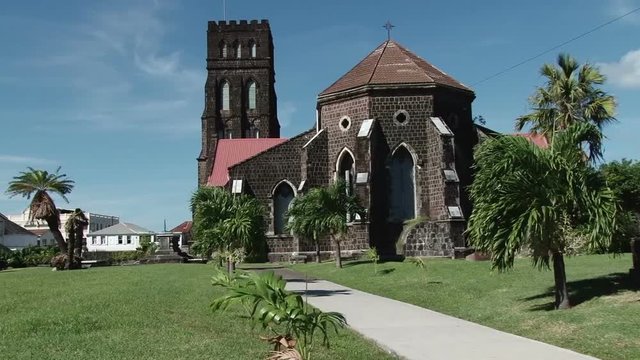 Saint George with Saint Barnabas Anglican Church in Basseterre, St Kitts. Wide view on a windy but sunny day