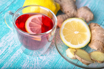 Lemon in a cup of tea with  ginger